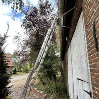 Écarteur de mur télescopique