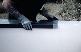 Positionnement de la patte de fixation sur le muret